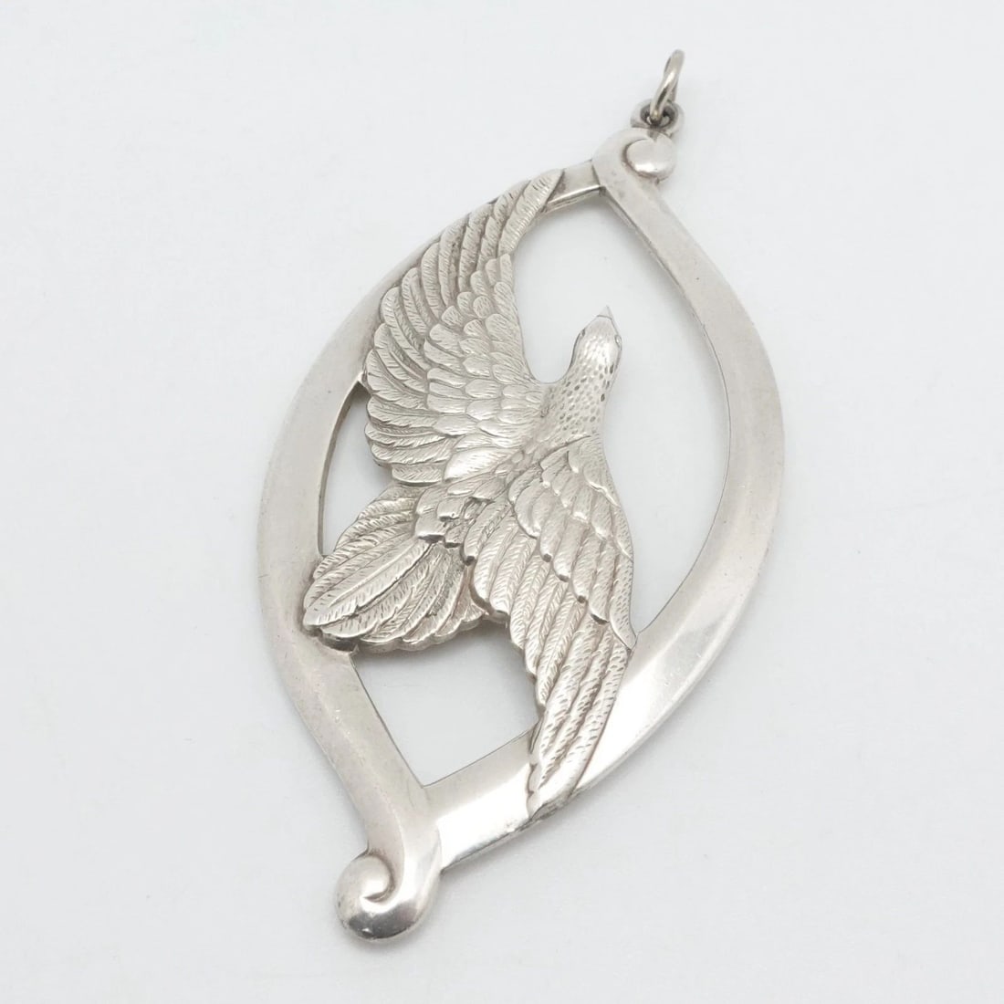 WALLACE STERLING SILVER DOVE ORNAMENT PEACE ON EARTH LARGE PENDANT 3.25": WALLACE STERLING SILVER DOVE ORNAMENT PEACE ON EARTH LARGE PENDANT 3.25" Wallace Sterling Silver Peace On Earth Dove Ornament Large Pendant Length - 3.25" Width - 1.57" Bail Height - 3mm Total Weight 