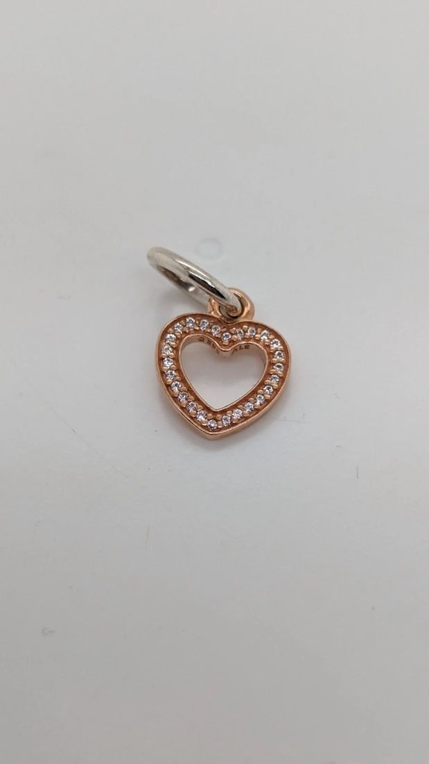 AUTHENTIC PANDORA 14K ROSE GOLD LOVE HEART RETIRED DANGLE CHARM ALE 585: AUTHENTIC PANDORA 14K ROSE GOLD LOVE HEART RETIRED DANGLE CHARM ALE 585 Authentic Pandora 14K Rose Gold Love Heart Retired Dangle Charm ALE 585 Style # 791357CZ Est. Retail - $120 USD