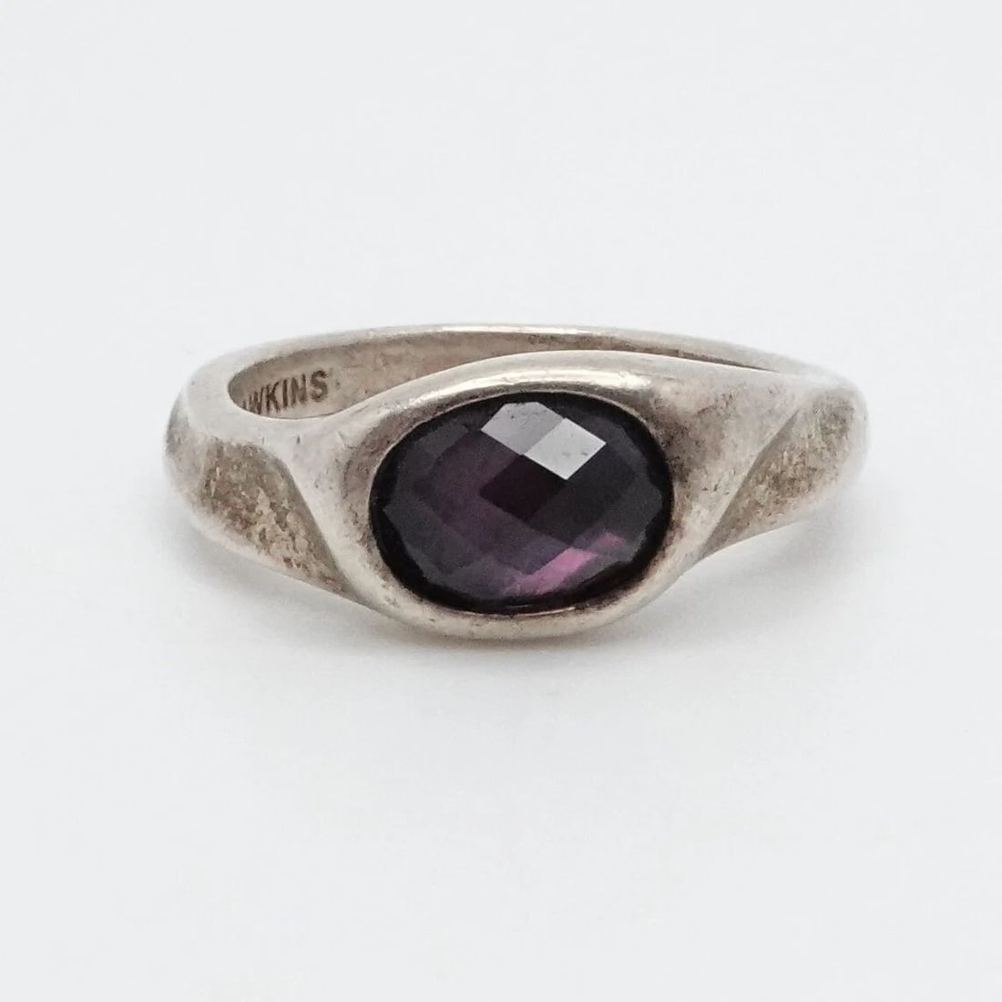 MICHAEL DAWKINS STERLING SILVER FACETED AMETHYST TWIST RING - SIZE 7.25: MICHAEL DAWKINS STERLING SILVER FACETED AMETHYST TWIST RING - SIZE 7.25 Michael Dawkins Sterling Silver Faceted Amethyst Twist Ring Size - 7.25 Band Width - 3mm Stone Size - 5mm x 7mm Total Weight - 5