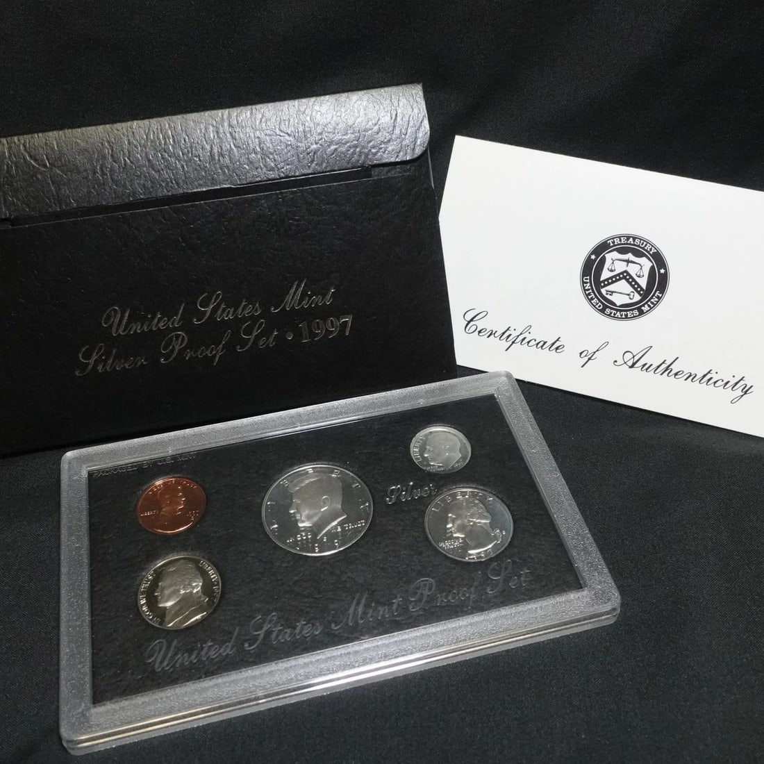 1997 S U.S MINT SILVER PROOF SET COA & BOX: 1997 S U.S MINT SILVER PROOF SET COA & BOX 1997 S U.S Mint Silver Proof Set COA & OGP Included **Coin Sets have not been opened or touched from their case. Please note, that tarnish occurs naturally &
