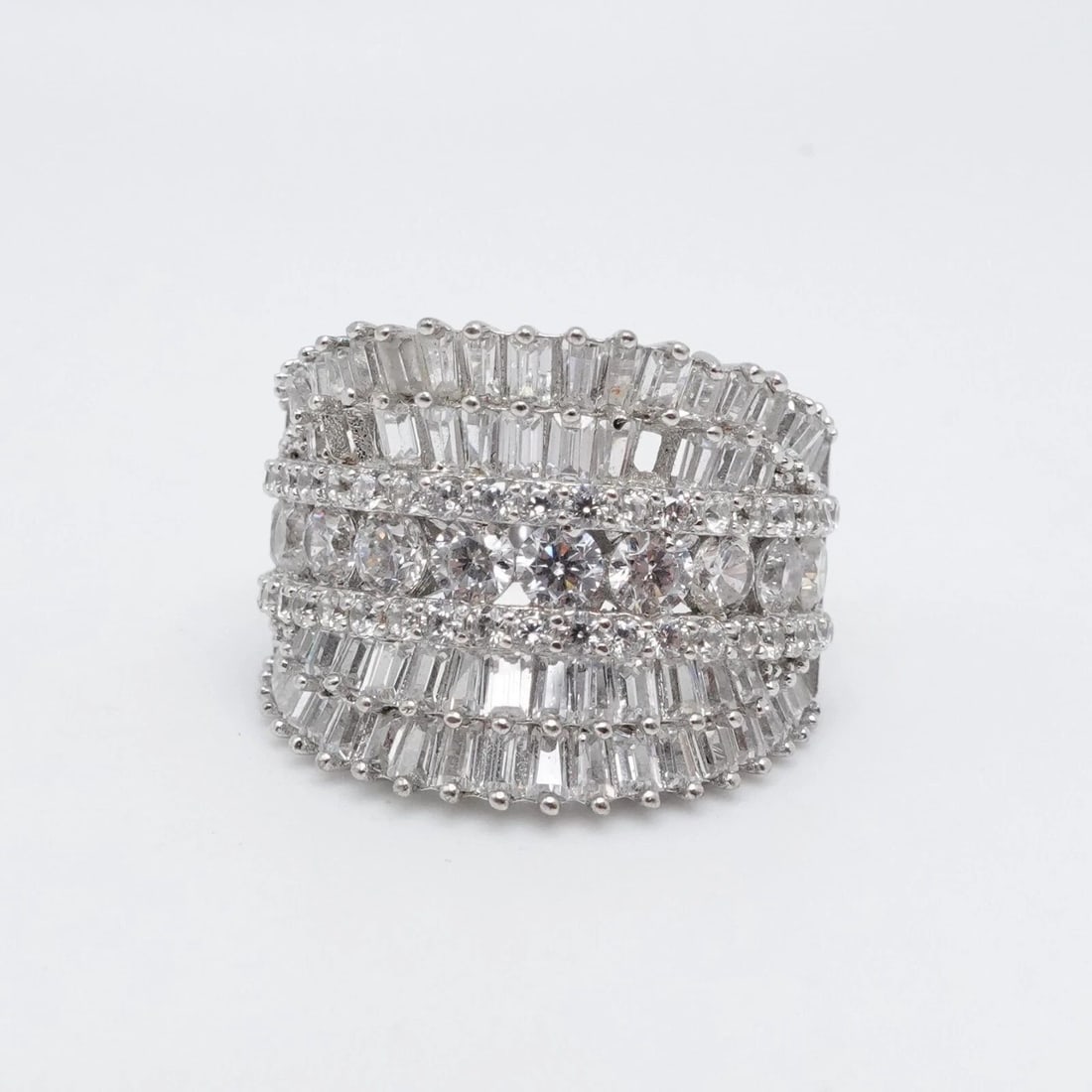 FZN STERLING SILVER ROUND & BAGUETTE CLEAR CZ CUBIC ZIRCONIA WIDE RING SIZE 7.25: FZN STERLING SILVER ROUND & BAGUETTE CLEAR CZ CUBIC ZIRCONIA WIDE RING SIZE 7.25 FZN Sterling Silver Round & Baguette Clear Cubic Zirconia Wide Ring Size - 7.25 Band Width - 3mm Total Weight - 6.9 Gra