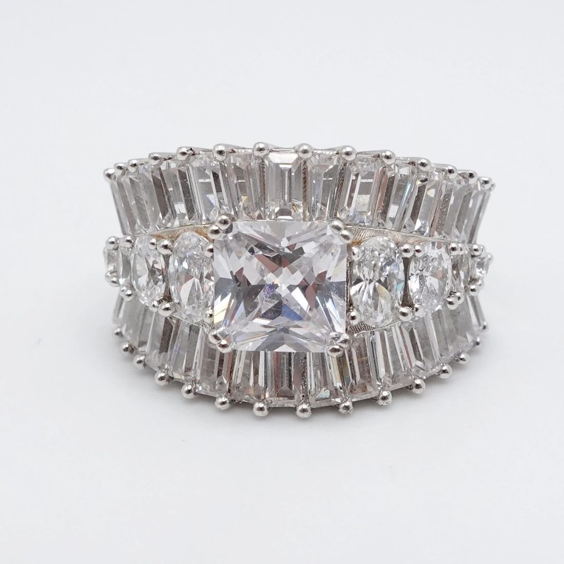 FZN STERLING SILVER PRINCESS CUT CLEAR CZ CUBIC ZIRCONIA WIDE RING SIZE 7.25: FZN STERLING SILVER PRINCESS CUT CLEAR CZ CUBIC ZIRCONIA WIDE RING SIZE 7.25 FZN Sterling Silver Clear Cubic Zirconia Princess & Baguette Wide Ring Size - 7.25 Band Width - 4mm Total Weight - 10 Grams