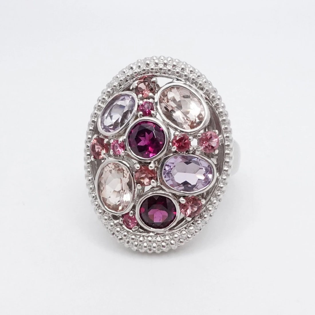 STERLING SILVER CLEAR AND PURPLE MULTI GEMSTONE CLUSTER RING - SIZE 10.25: STERLING SILVER CLEAR AND PURPLE MULTI GEMSTONE CLUSTER RING - SIZE 10.25 Sterling Silver Clear and Purple Multi Gemstone Cluster Ring Size - 10.25 Band Width - 3mm Height - 27mm Width - 21mm Total We