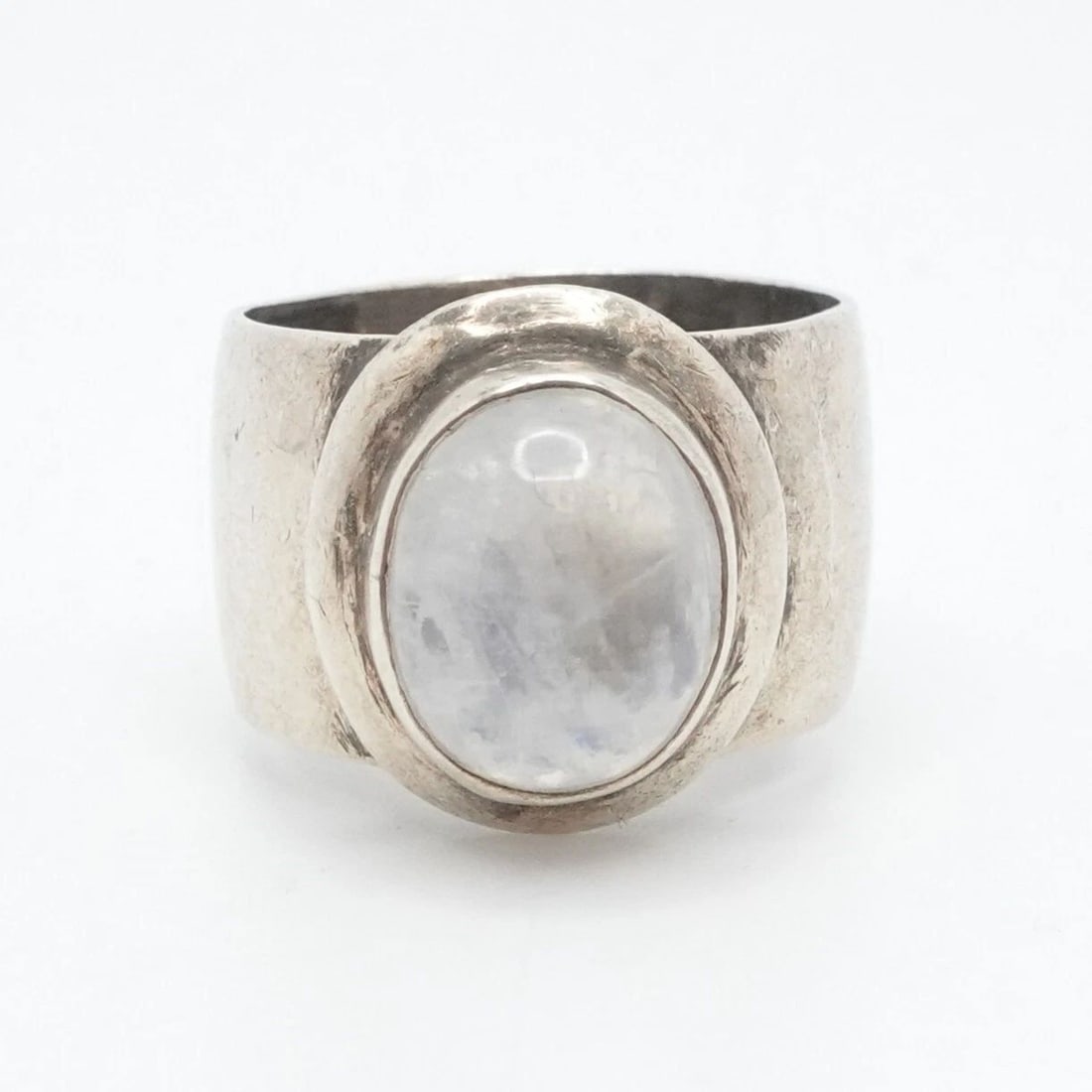 SILVER MOONSTONE GEMSTONE CABOCHON WIDE BAND RING SIZE 6.5: SILVER MOONSTONE GEMSTONE CABOCHON WIDE BAND RING SIZE 6.5 Vintage Silver Moonstone Gemstone Cabochon Wide Band Bezel Ring Size - 6.5 Band Width - 11.5mm Gemstone Size - 9mm x 12mm Total Weight - 7.6 