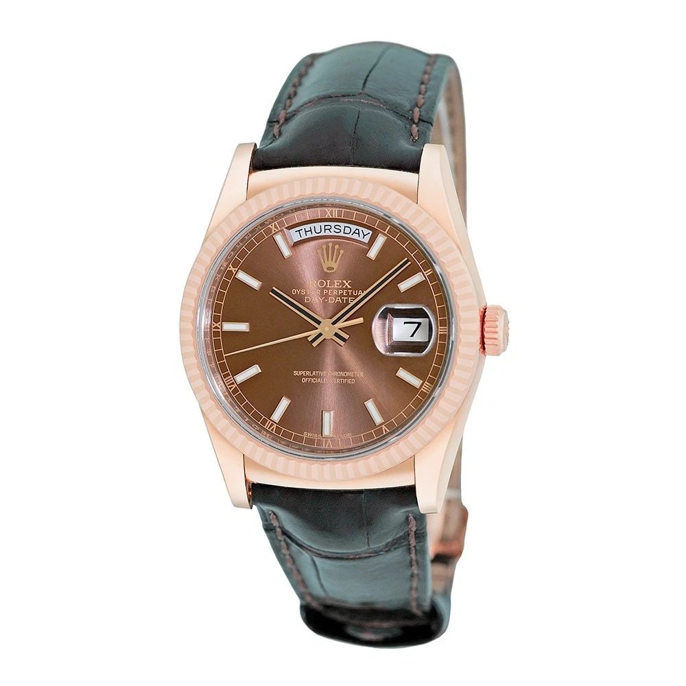 ROLEX 18K ROSE GOLD 36MM DAY-DATE 118135 BOX WARRANTY 2016: ROLEX 18K ROSE GOLD 36MM DAY-DATE 118135 BOX WARRANTY 2016 BRAND: Rolex Model: Day-Date Reference No: 118135 Case Measurements: Case Diameter: 36mm Case Thickness: 12mm Water Resistance: 100m / 330ft 
