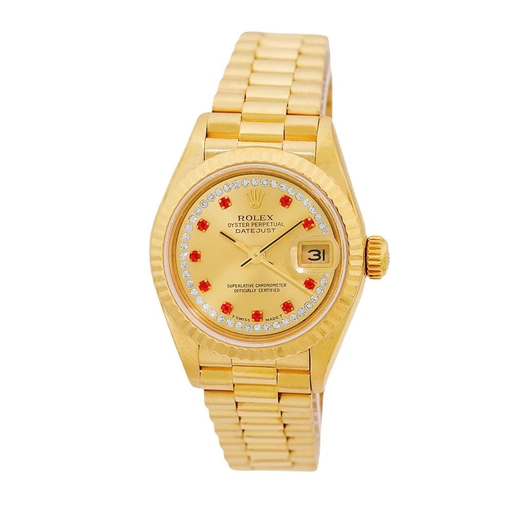 ROLEX 18K YELLOW GOLD 26MM PRESIDENT FACTORYRUBY DIAMOND DIAL 69178 BOX WARRANTY: ROLEX 18K YELLOW GOLD 26MM PRESIDENT FACTORYRUBY DIAMOND DIAL 69178 BOX WARRANTY BRAND: Rolex Model: President Reference No: 69178 Case Measurements: Case Diameter: 26mm Case Thickness: 10mm Water Res