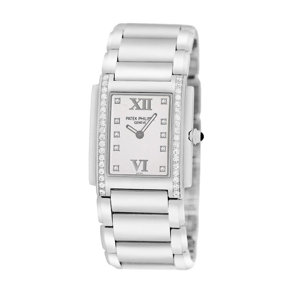 PATEK PHILIPPE STAINLESS STEEL 25MM DIAMOND 4910 TWENTY-4 BOX WARRANTY MINTY: PATEK PHILIPPE STAINLESS STEEL 25MM DIAMOND 4910 TWENTY-4 BOX WARRANTY MINTY BRAND: Patek Philippe Model: Twenty-4 Reference No: 4910/10A - 011 Gender: Lady’s Movement: Swiss Quartz Accuracy Movemen