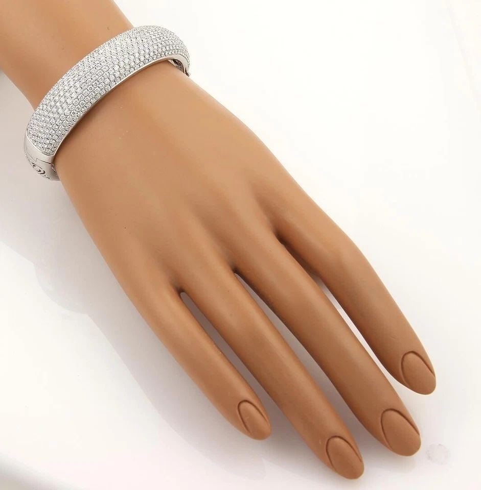GORGEOUS 8.6CT DIAMONDS 18K WHITE GOLD 15MM WIDE DOME BANGLE BRACELET: GORGEOUS 8.6CT DIAMONDS 18K WHITE GOLD 15MM WIDE DOME BANGLE BRACELET This is a magnificent diamond bangle bracelet, it is crafted from solid 18k white gold with a high polished finish. It features an