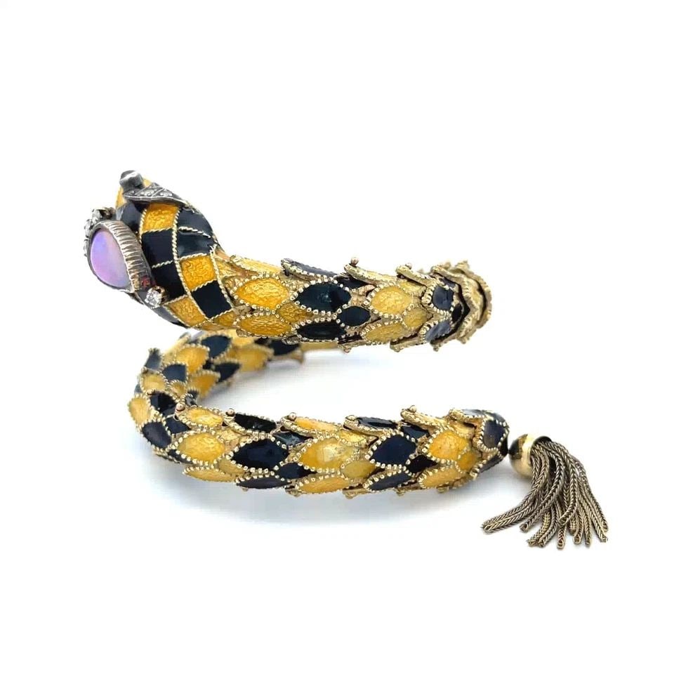 DIAMOND OPAL GARNET & ENAMEL 14K YELLOW GOLD SNAKE WRAP BRACELET: DIAMOND OPAL GARNET & ENAMEL 14K YELLOW GOLD SNAKE WRAP BRACELET This is a unique style fashionable vintage wrap bracelet; it is crafted from 14k yellow gold featuring a long-coiled snake featuring la
