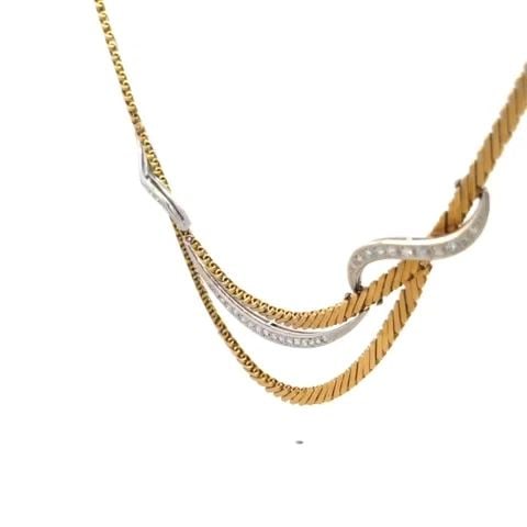 CARL BURCHERER DIAMOND NECKLACE 18K GOLD FANCY BIB DESIGN: CARL BURCHERER DIAMOND NECKLACE 18K GOLD FANCY BIB DESIGN This beautiful authentic bib necklace is from Carl Burcherer, it is crafted from 18k yellow and white gold featuring a triple layered bib styl