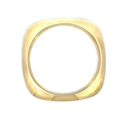 TIFFANY & CO. GOLD BANGLE 18K YELLOW SQUARE ROUND STYLE 53 GRAMS: TIFFANY & CO. GOLD BANGLE 18K YELLOW SQUARE ROUND STYLE 53 GRAMS This Tiffany & Co. bangle in 18k yellow gold is a vintage piece of fine jewelry from the renowned brand, Tiffany & Co. It is a classic 