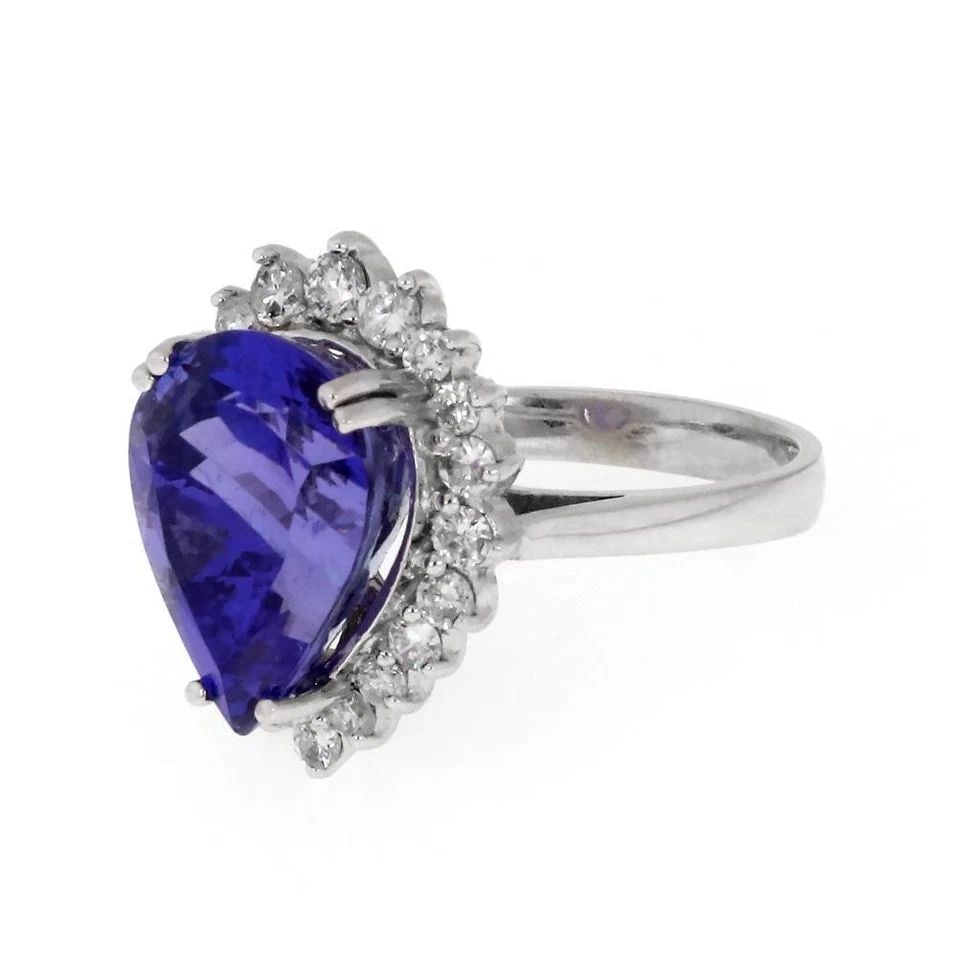 TANZANITE DIAMOND RING 14K WHITE GOLD PEAR SHAPE STUNNING 8.72CT: TANZANITE DIAMOND RING 14K WHITE GOLD PEAR SHAPE STUNNING 8.72CT Stunning 8.72ct Tanzanite Diamond 14k White Gold Pear Shape Ring Description This magnificent cocktail ring is crafted from 14k white g
