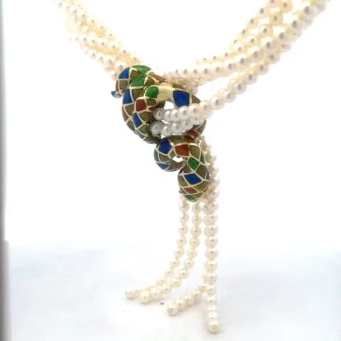 14K ENAMEL DIAMOND SNAKE PENDANT 6 STRAND PEARLS YELLOW GOLD NECKLACE: 14K ENAMEL DIAMOND SNAKE PENDANT 6 STRAND PEARLS YELLOW GOLD NECKLACE This is a majestic pendant and multi-strand pearl necklace, the pendant is crafted from 14k yellow gold featuring a stunning coile