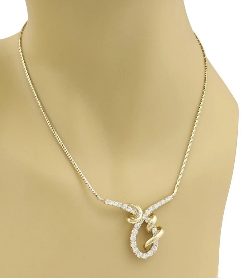 JOSE HESS 14K YELLOW GOLD 3CTW DIAMOND FANCY DESIGN NECKLACE: JOSE HESS 14K YELLOW GOLD 3CTW DIAMOND FANCY DESIGN NECKLACE Jose Hess 14k Yellow Gold 3ctw Diamond Fancy Design Necklace Description This lovely authentic necklace is by designer Jose Hess, it is cra