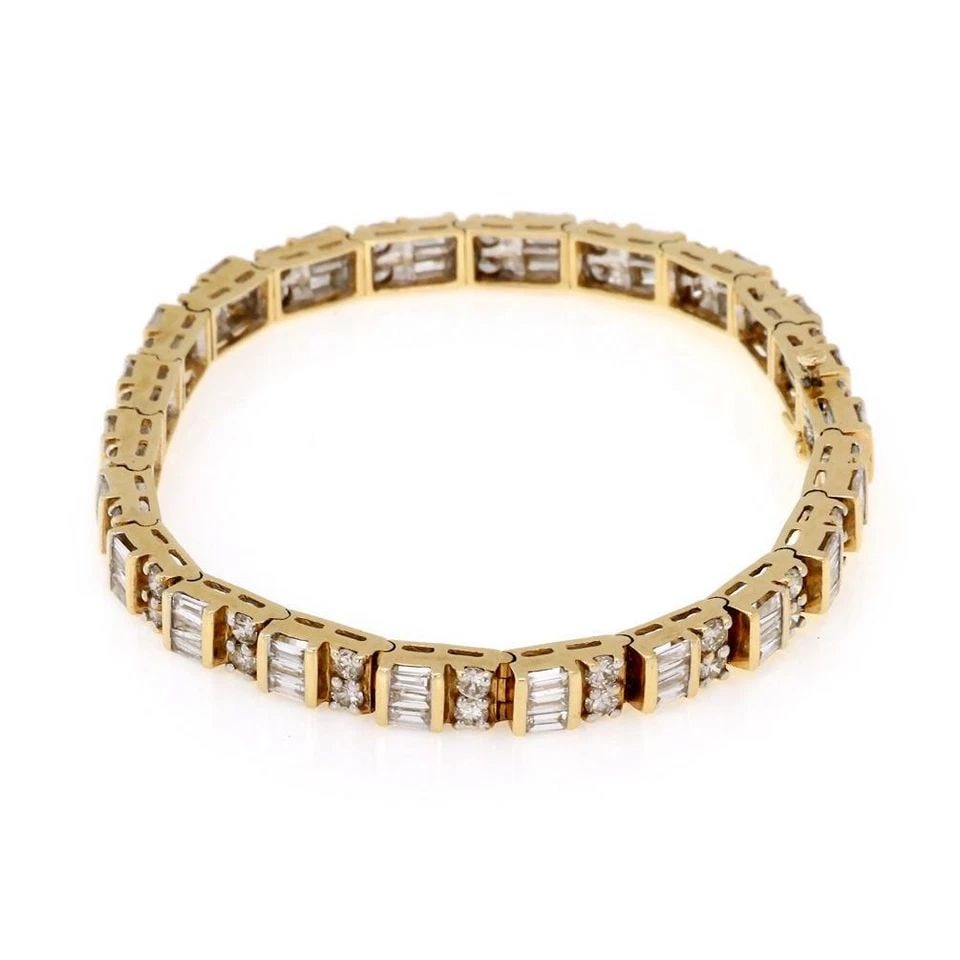 CLASSIC 6.00CT DIAMOND 14K YELLOW GOLD TENNIS BRACELET: CLASSIC 6.00CT DIAMOND 14K YELLOW GOLD TENNIS BRACELET Classic 6.00ct Diamond 14k Yellow Gold Tennis Bracelet Description This is an elegant tennis bracelet, it is crafted from 14k yellow gold featuri