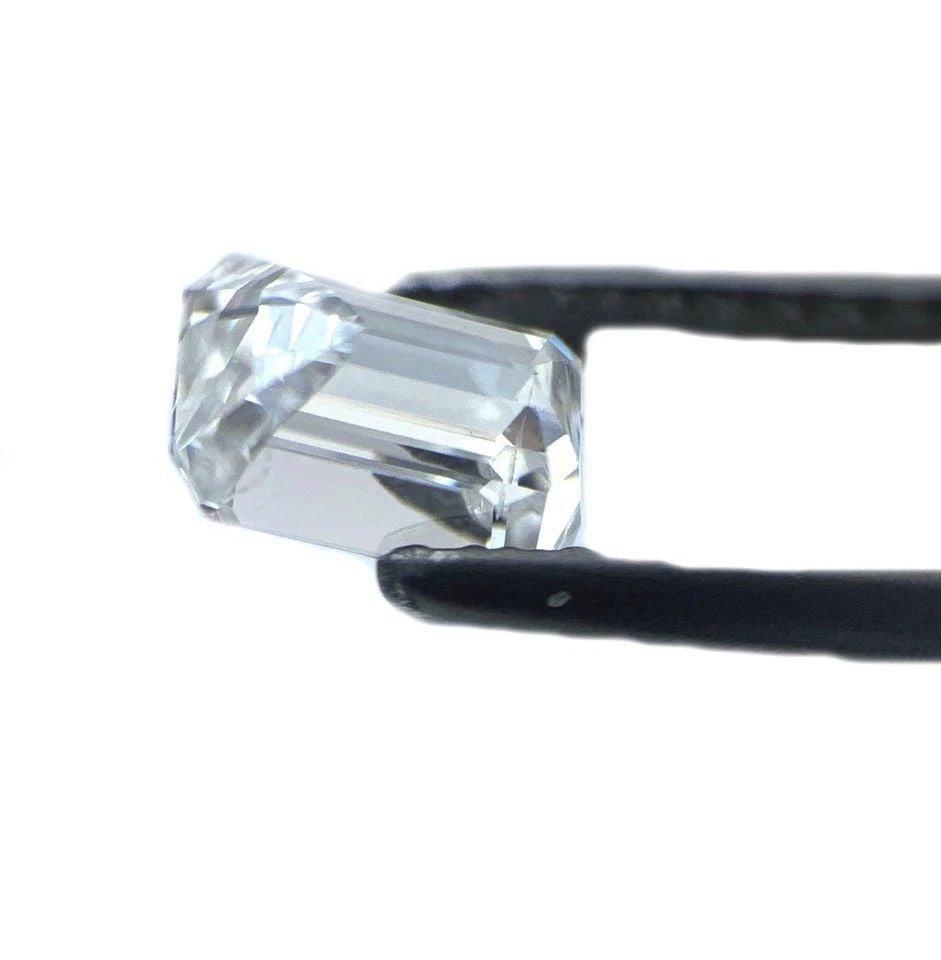 EMERALD CUT 0.74 CARAT LOOSE E-F DIAMOND SOLITAIRE: EMERALD CUT 0.74 CARAT LOOSE E-F DIAMOND SOLITAIRE 2248 Emerald Cut 0.74 Carat Loose E-F Diamond Solitaire Description This is a genuine untreated 0.74 carat emerald cut natural solitaire diamond. It 