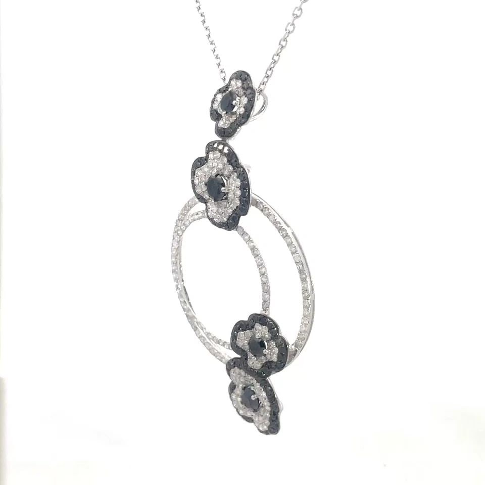 DIAMOND GOLD LARGE PENDANT NECKLACE 3.5CT BLACK & WHITE FLORAL STYLE 18K: DIAMOND GOLD LARGE PENDANT NECKLACE 3.5CT BLACK & WHITE FLORAL STYLE 18K Elevate your jewelry collection with this large diamond and 18k white gold pendant, it comes with a 14k white gold chain, showc