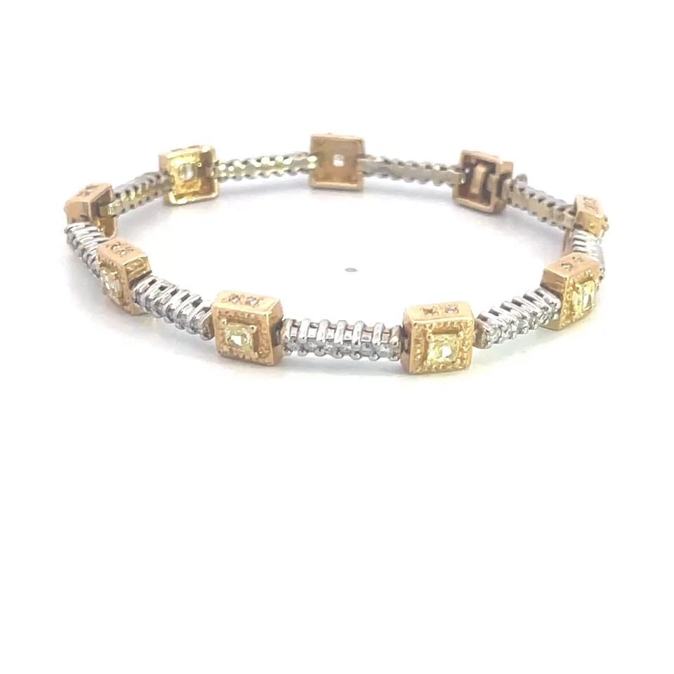 DIAMOND 18K GOLD BRACELET CUBE & BAR LINKS TWO TONE YELLOW DIAMOND: This beautiful bracelet is crafted from 18k yellow and white gold, it featuring slim long bar like link in white gold with prong set diamonds, between each diamond set bar is a cut out square shape mo