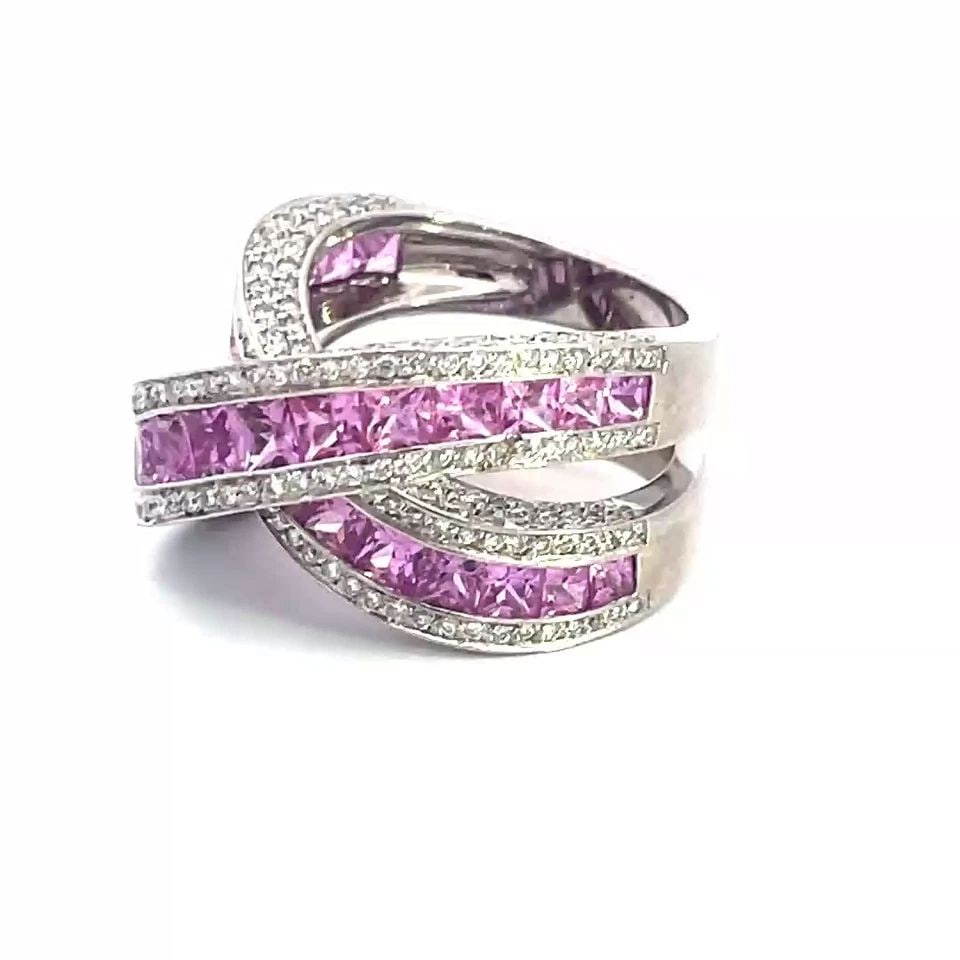 CRIVELLI DIAMOND GOLD RING PINK SAPPHIRE 7CT 18K WHITE CROSSOVER BAND SIZE 7: CRIVELLI DIAMOND GOLD RING PINK SAPPHIRE 7CT 18K WHITE CROSSOVER BAND SIZE 7 This gorgeous designer Crivelli ring is crafted from 18k white gold featuring double bands set in an X crossover design on 