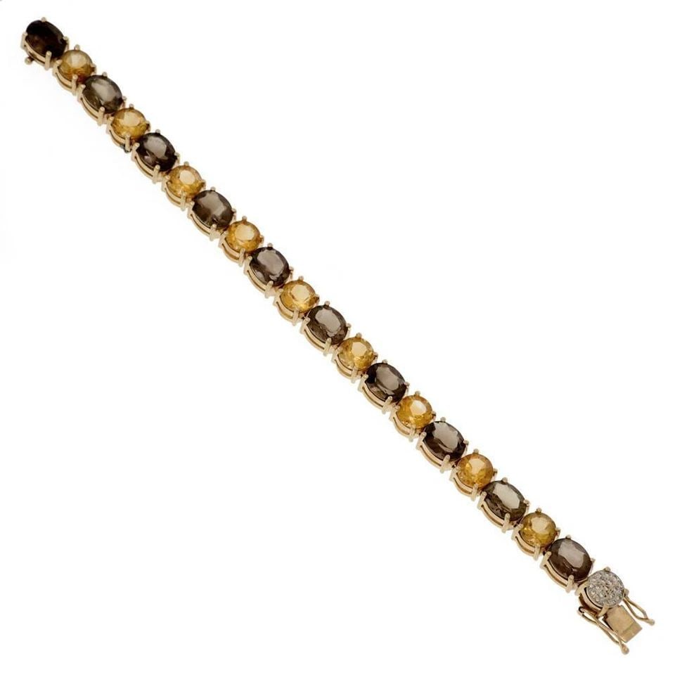 ESTATE 55.10CT DIAMOND CITRINE SMOKY QUARTZ 14K GOLD BRACELET: ESTATE 55.10CT DIAMOND CITRINE SMOKY QUARTZ 14K GOLD BRACELET Estate 55.10ct Diamond Citrine Smoky Quartz 14k Gold Bracelet Description This is a vintage large link bracelet, crafted from 14k yellow g