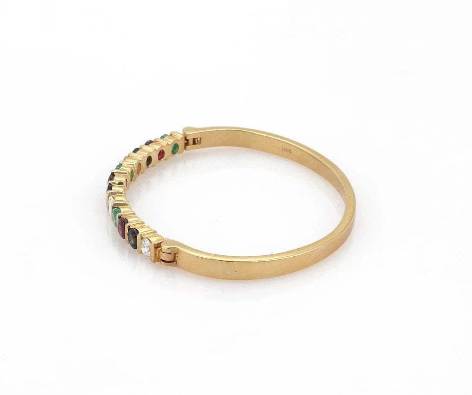 DIAMOND MULTI GEMS BRACELET 18K YELLOW GOLD BANGLE: DIAMOND MULTI GEMS BRACELET 18K YELLOW GOLD BANGLE 715 Estate 4.40ct Diamond Multi-Color Gems 18k YGold Bangle Bracelet Description This is a beautiful and elegant oval shaped bangle, crafted from 18k