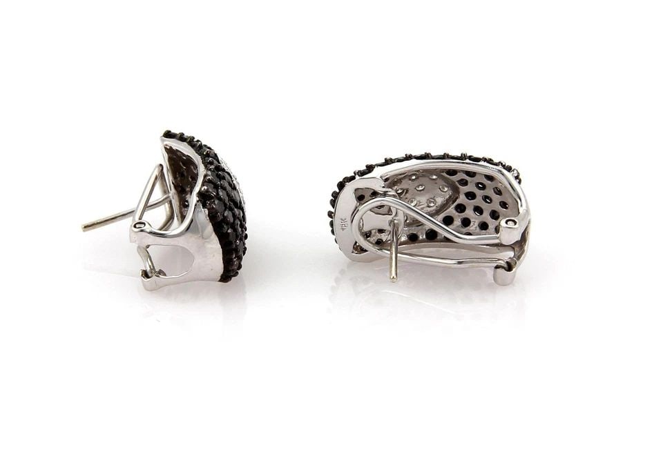 WIDE 4.56 CARATS BLACK &WHITE DIAMOND 18K GOLD HEART EARRINGS: WIDE 4.56 CARATS BLACK &WHITE DIAMOND 18K GOLD HEART EARRINGS Wide 4.56 Carats Black &White Diamond 18k Gold Heart Earrings Description This lovely pair of earrings are crafted from 18k white gold. It