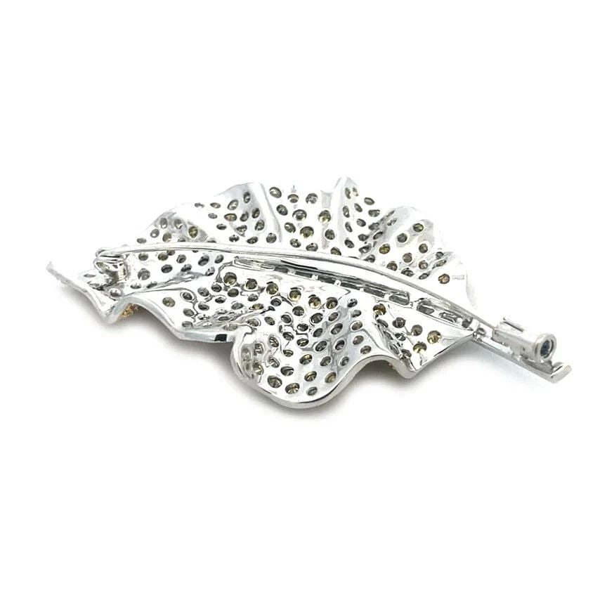 YELLOW DIAMOND LEAF BROOCH 18K GOLD TWO TONE WHITE AND YELLOW DIAMONDS: This is a gorgeous leaf brooch, it is crafted from 18k white and yellow gold featuring sparkling pave set yellow diamonds covering the entire top on warm yellow gold which adds a touch of natural eleg