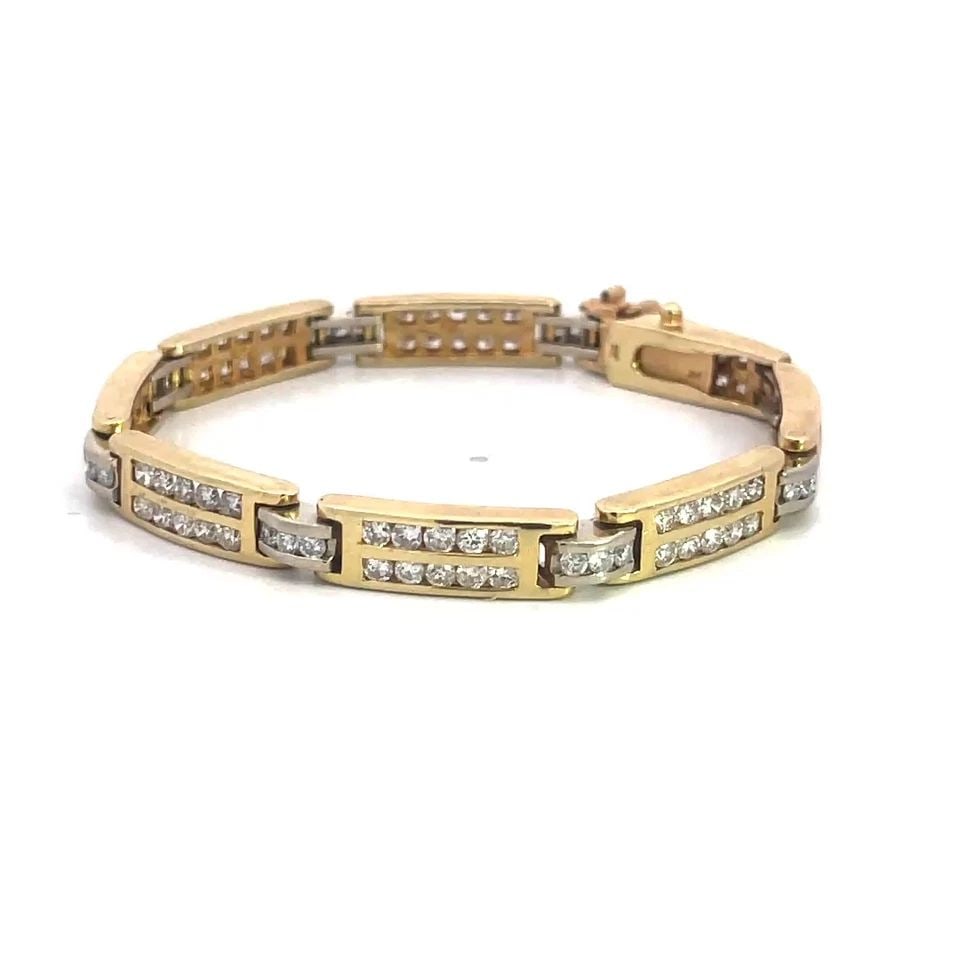 DIAMOND GOLD BRACELET 14K TWO TONE CHANNEL SET BAR LINK STYLE 4 CARATS: DIAMOND GOLD BRACELET 14K TWO TONE CHANNEL SET BAR LINK STYLE 4 CARATS This diamond and gold bracelet is a beautiful piece of fine jewelry featuring long and short alternating bar links with double ro