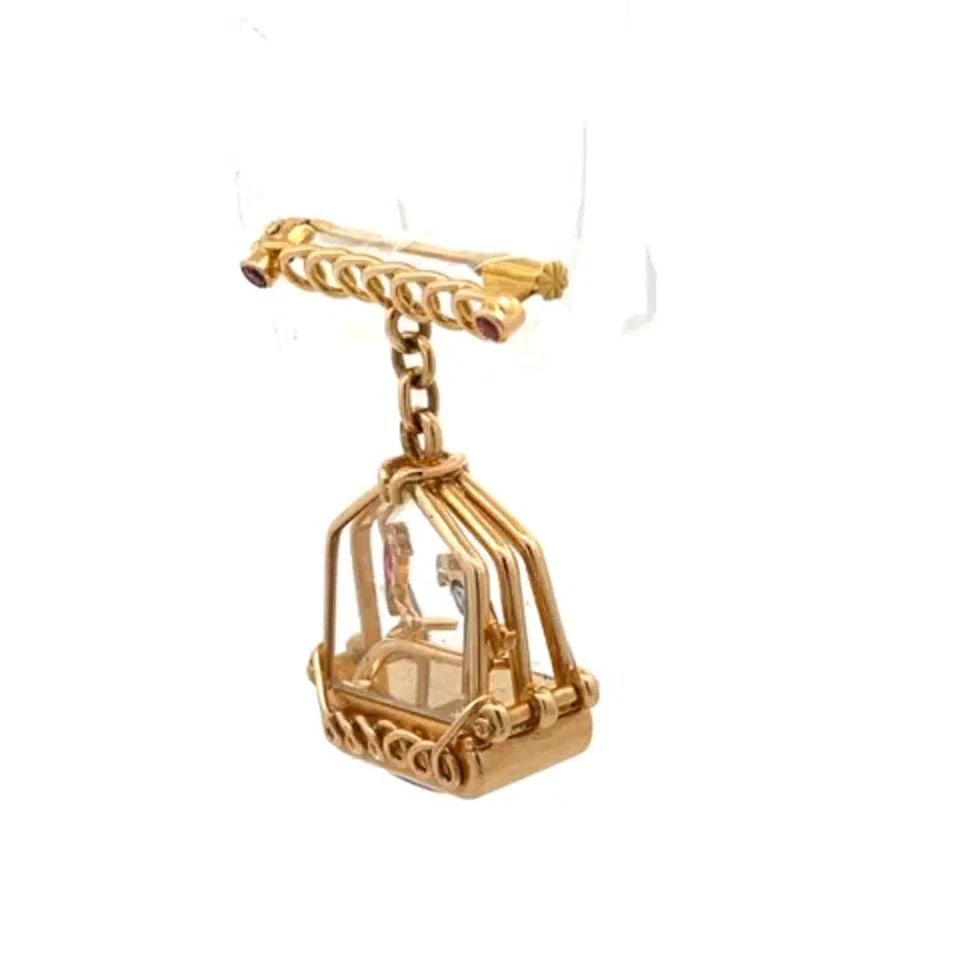 DIAMOND & GEMS 18K ROSE GOLD BIRD CAGE DANGLE WATCH FOB BROOCH: DIAMOND & GEMS 18K ROSE GOLD BIRD CAGE DANGLE WATCH FOB BROOCH This unique and interesting watch fob brooch is crafted from 18k rose gold featuring a triple split frame bird cage with glass on each si