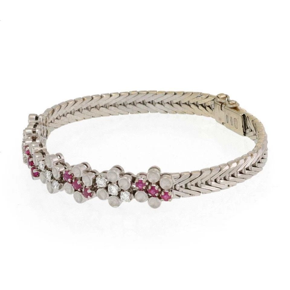 LOVELY DIAMOND RUBY 18K WHITE GOLD FLORAL BRACELET -: LOVELY DIAMOND RUBY 18K WHITE GOLD FLORAL BRACELET - Lovely Diamond Ruby 18k White Gold Floral Bracelet - Description This gorgeous floral bracelet is crafted from 18k white gold featuring a centerpie