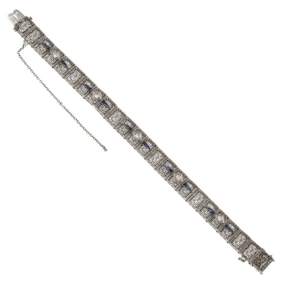 ART DECO1.30CT DIAMOND SAPPHIRE 14K WHITE GOLD FILIGREE BRACELET: ART DECO1.30CT DIAMOND SAPPHIRE 14K WHITE GOLD FILIGREE BRACELET Art Deco1.30ct Diamond Sapphire 14k White Gold Filigree Bracelet Description This gorgeous Art Deco bracelet is crafted from 14k white 