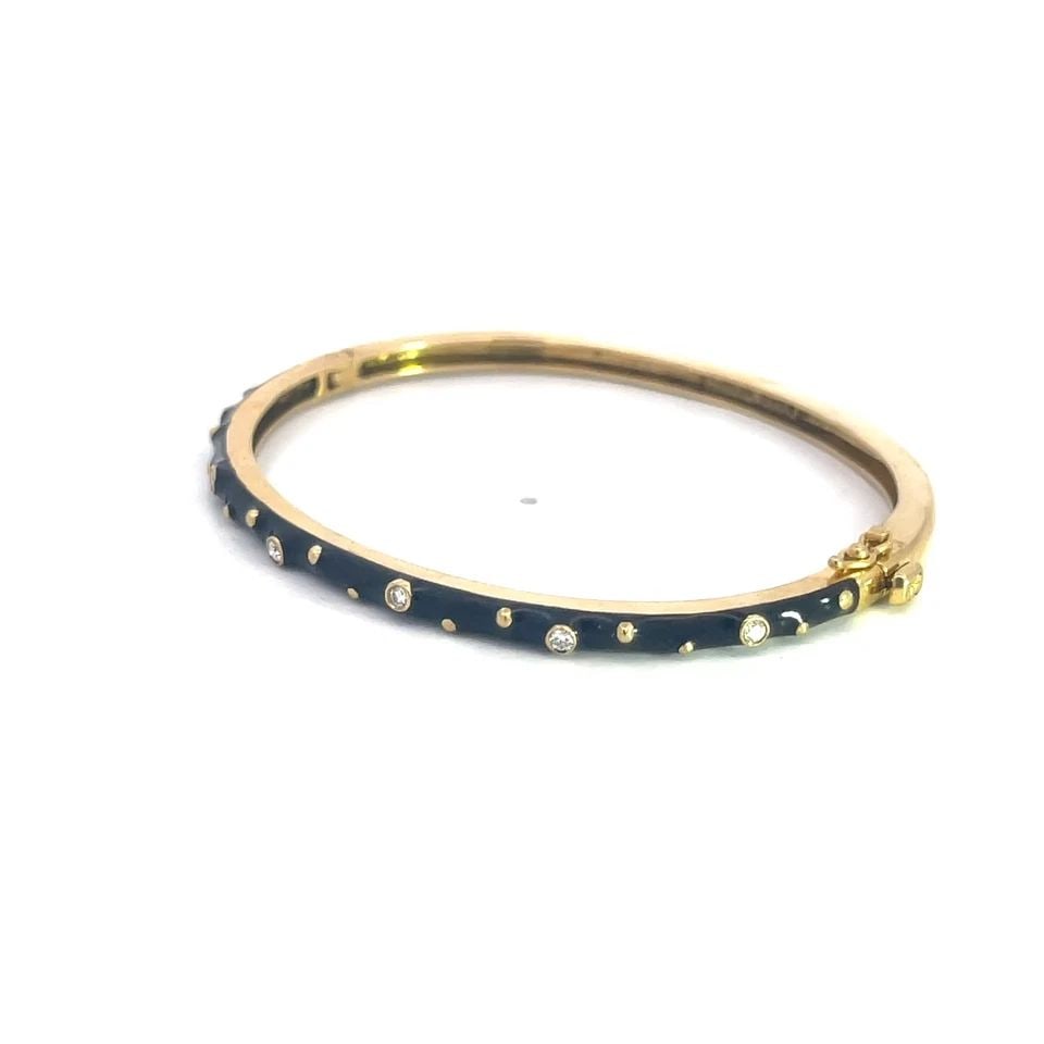 HIDALGO DIAMOND GOLD BANGLE BLACK ENAMEL 18K YELLOW SLIM OVAL SHAPE HINGED: This is an authentic bangle by Hidalgo, it is crafted from 18k yellow gold featuring a slim dome bangle oval shaped with hinged mechanism on one side and slide clasp. The front half has black enamel w
