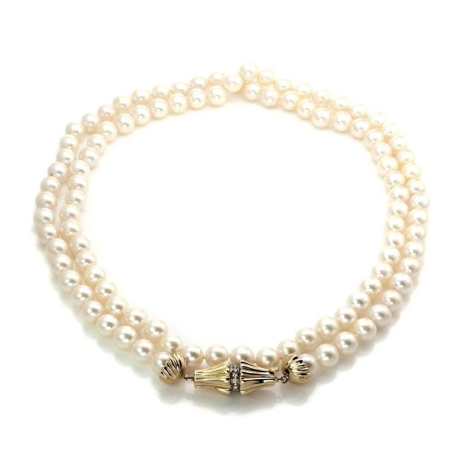 14K YELLOW GOLD DIAMOND AND PEARL NECKLACE 36" LONG: 14K YELLOW GOLD DIAMOND AND PEARL NECKLACE 36" LONG 14k Yellow Gold Diamond and Pearl Necklace 36" Long Description This elegant vintage necklace has a long single strand pearls. It has a lovely fancy