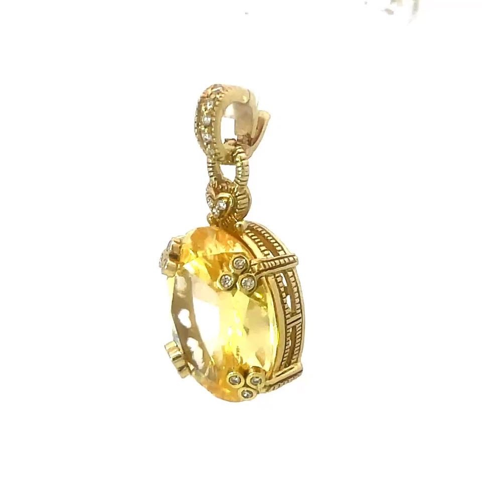 JUDITH RIPKA DIAMOND GOLD PENDANT YELLOW COLORED STOEN 18K YELLOW OVAL SHAPE: JUDITH RIPKA DIAMOND GOLD PENDANT YELLOW COLORED STOEN 18K YELLOW OVAL SHAPE The Judith Ripka Gold Pendant features a stunning large oval-shaped yellow colored stone set in 18k yellow gold accented wi