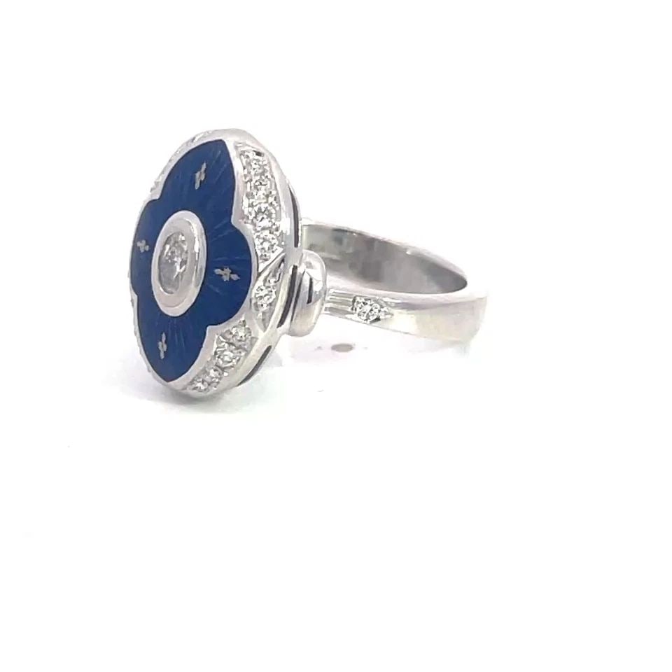 FABERGÉ DIAMOND GOLD RING GUILLOCHE ENAMEL OVAL 18K WHITE GERMANY LTD ED.: FABERGÉ DIAMOND GOLD RING GUILLOCHE ENAMEL OVAL 18K WHITE GERMANY LTD ED. Authentic from Fabergé, this lovely oval top ring is crafted from 18k white gold featuring a floral shape diamond bezel with