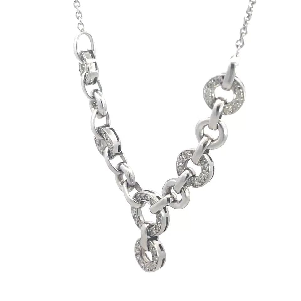 7097 DIAMOND GOLD NECKLACE 18K WHITE PAVE SET CIRCLE LINK CENTERPIECE: 7097 DIAMOND GOLD NECKLACE 18K WHITE PAVE SET CIRCLE LINK CENTERPIECE The lovely diamond and gold necklace features a beautiful circle link centerpiece set with natural white diamonds in an 18k white 