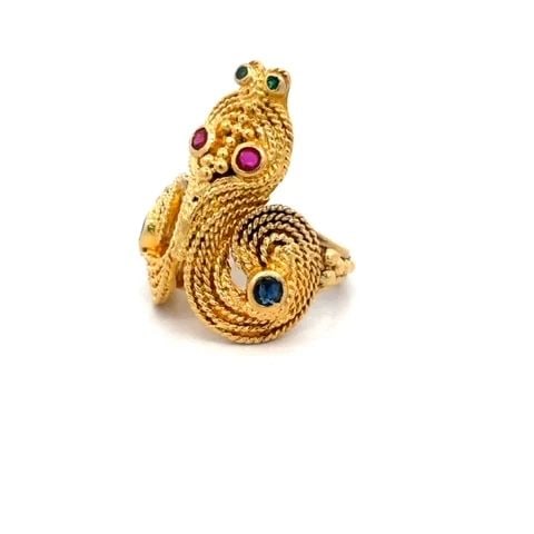 RUBY SNAKE RING SAPPHIRE EMERALD 18K YELLOW GOLD CABLE GREEK STYLE: RUBY SNAKE RING SAPPHIRE EMERALD 18K YELLOW GOLD CABLE GREEK STYLE This is an 18k yellow gold ring featuring a multi-row fine twisted rope fashioned into a snake's head with ruby eyes and emerald nose