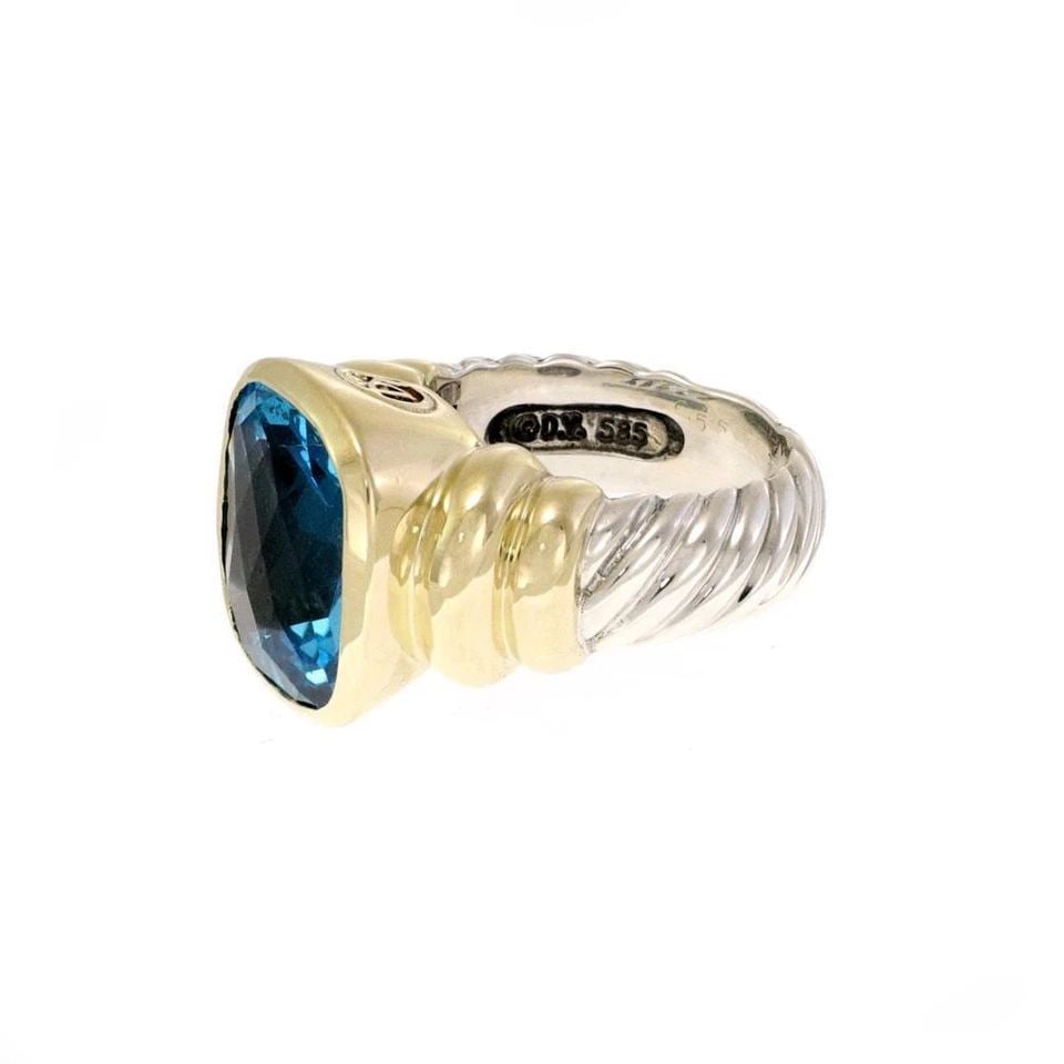 DAVID YURMAN NOBLESSE BLUE TOPAZ 14K GOLD 925 SILVER CABLE RING: DAVID YURMAN NOBLESSE BLUE TOPAZ 14K GOLD 925 SILVER CABLE RING David Yurman Noblesse Blute Topaz 14k Gold 925 Silver Cable Ring Description This authentic ring is by David Yurman from the Noblesse Co