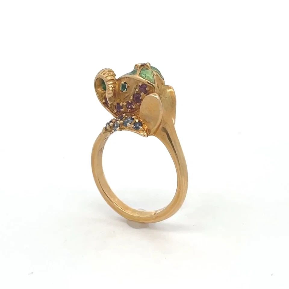 VINTAGE MULTICOLOR GEMS 14K YELLOW GOLD ENAMEL ELEPHANT BYPASS RING SIZE 11: VINTAGE MULTICOLOR GEMS 14K YELLOW GOLD ENAMEL ELEPHANT BYPASS RING SIZE 11 This is an adorable vintage bypass style ring, it is crafted from 14k yellow gold featuring a 3.5mm band with an elephant he