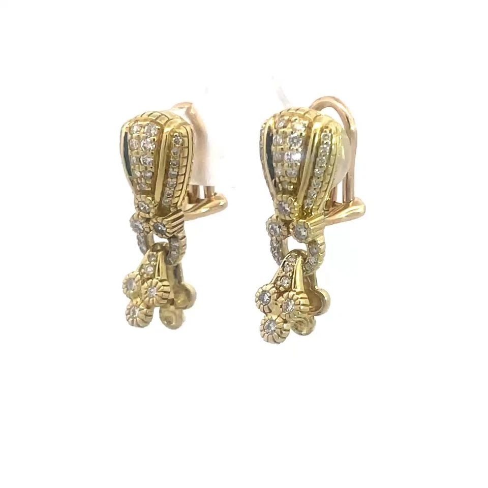 JUDITH RIPKA DIAMOND GOLD EARRINGS 18K YELLOW FLORAL DANGLE STYLE: JUDITH RIPKA DIAMOND GOLD EARRINGS 18K YELLOW FLORAL DANGLE STYLE These Judith Ripka Diamond Gold Earrings are a stunning pair of 18k yellow floral dangle style earrings featuring fancy long shape dan