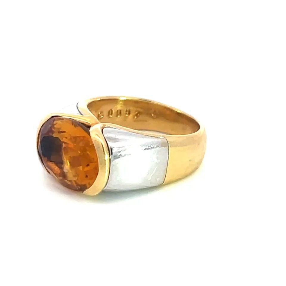 MARINA BULGARI CITRINE GOLD RING 18K TWO TONE OVAL TOP: MARINA BULGARI CITRINE GOLD RING 18K TWO TONE OVAL TOP The Marina Bulgari Citrine Gold Ring is a stunning piece of fine jewelry featuring an oval-shaped top with a half bezel set oval cut citrine gems