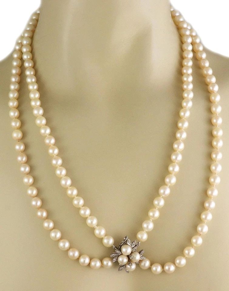 VINTAGE DIAMOND PEARL 14K WHITE GOLD DOUBLE STRAND NECKLACE: VINTAGE DIAMOND PEARL 14K WHITE GOLD DOUBLE STRAND NECKLACE Vintage Diamond Pearl 14k White Gold Double Strand Necklace Description This lovely vintage necklace features a double strand creamy culture