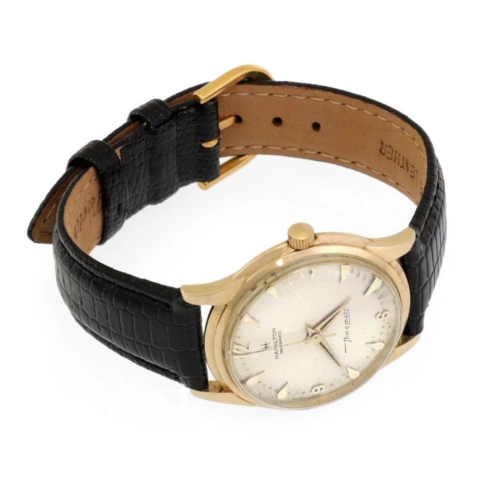 HAMILTON MASTERPIECE THIN-O-MATIC VINTAGE THIN 14K GOLD MEN'S WATCH: HAMILTON MASTERPIECE THIN-O-MATIC VINTAGE THIN 14K GOLD MEN'S WATCH Hamilton Masterpiece Thin-O-Matic Vintage Thin 14k Gold Men's Watch Description This is a vintage authentic men's wrist watch from H