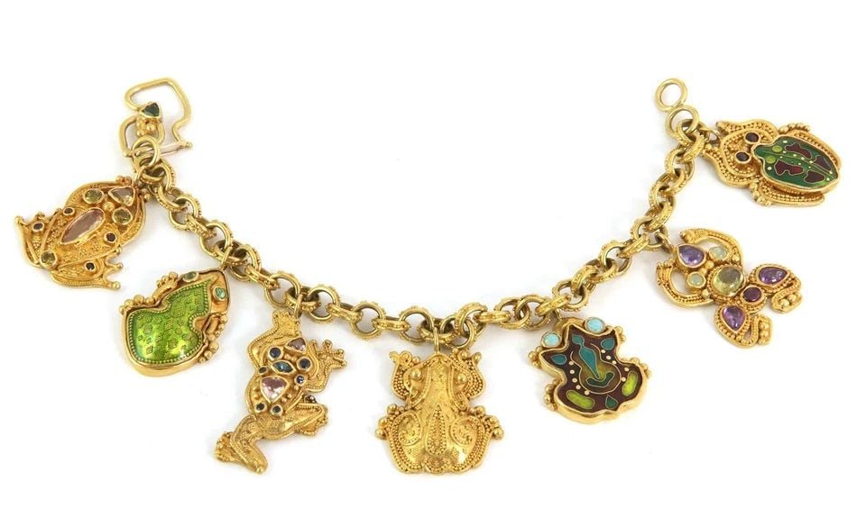CHARMS BRACELET LUNA FELIX ENAMEL & GEMSTONE 22K 18K GOLD 7 FROGS: CHARMS BRACELET LUNA FELIX ENAMEL & GEMSTONE 22K 18K GOLD 7 FROGS CHARMS BRACELET LUNA FELIX ENAMEL & GEMSTONE 22K 18K GOLD 7 FROGS The Luna Felix Charms Bracelet features a delightful design with sev
