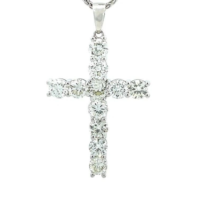 DIAMOND 18K CROSS PENDANT 6.94CT DIAMOND 18K WHITE GOLD & 14K GOLD CHAIN NEW: DIAMOND 18K CROSS PENDANT 6.94CT DIAMOND 18K WHITE GOLD & 14K GOLD CHAIN NEW This is a gorgeous NEW pendant and chain. The pendant is crafted from 18k white gold featuring a Cross with 11 brilliant ro
