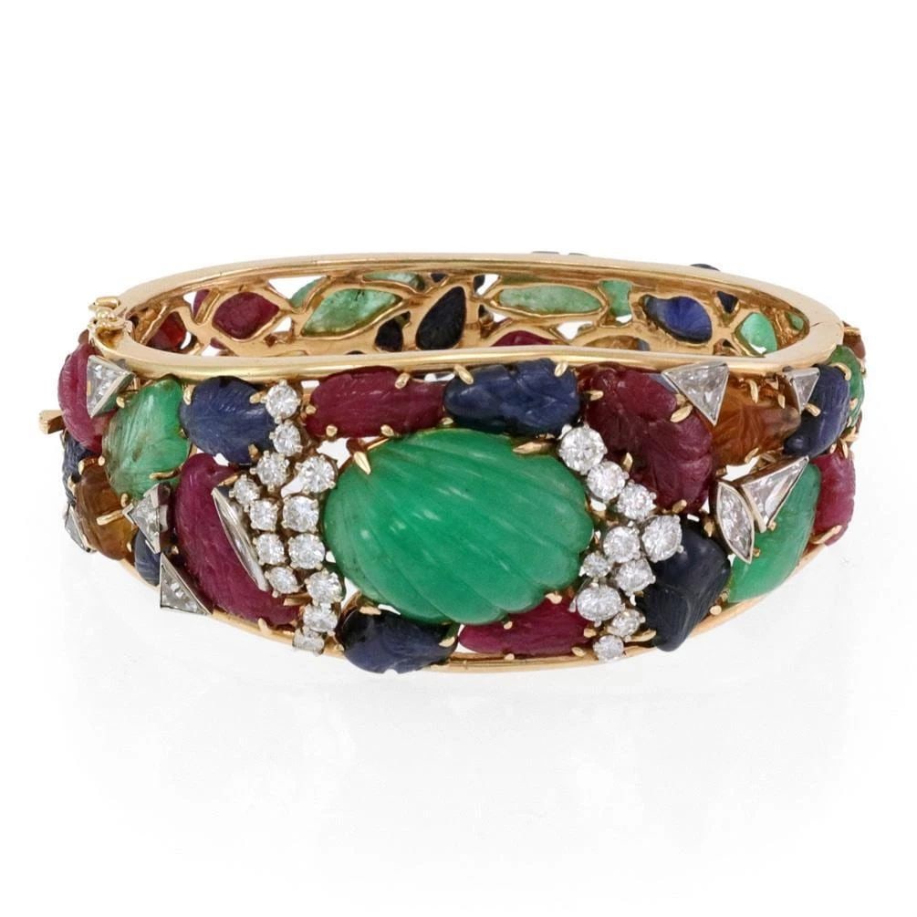 DIAMOND BRACELET TUTTI FRUTTI MULTICOLOR GEMS 14K YELLOW GOLD: DIAMOND BRACELET TUTTI FRUTTI MULTICOLOR GEMS 14K YELLOW GOLD DIAMOND BRACELET TUTTI FRUTTI MULTICOLOR GEMS 14K YELLOW GOLD The product is a vintage Tutti Frutti multicolor gemstone bracelet set in 14