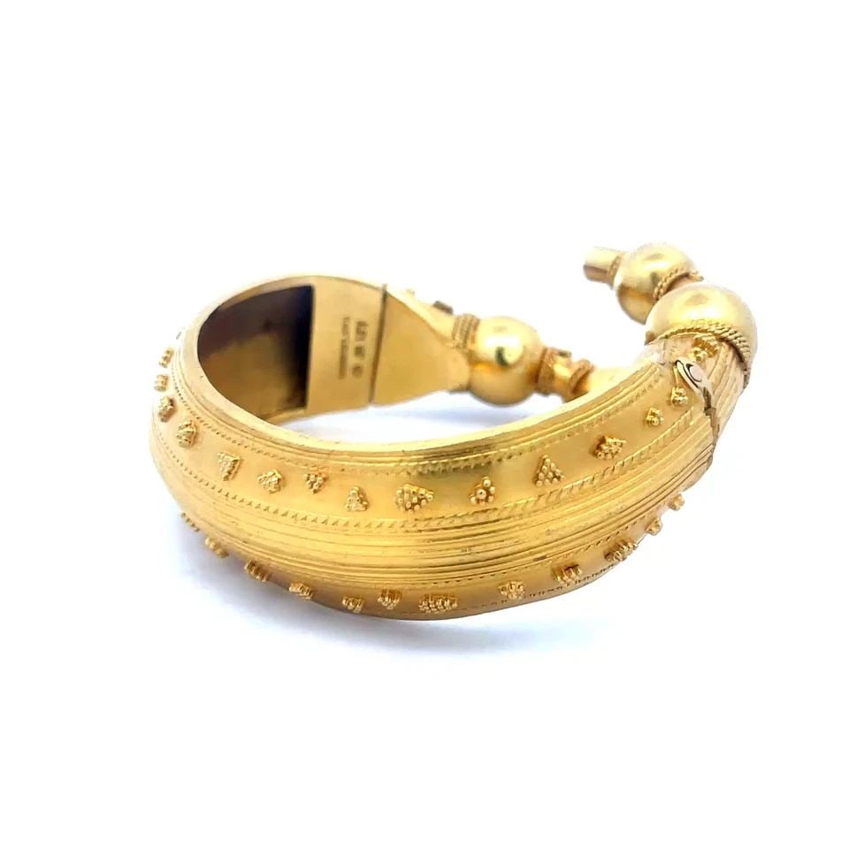 ILIAS LALAOUNIS GOLD BRACELET 22K YELLOW ETRUSCAN BYPASS WIDE TWIST BAND: ILIAS LALAOUNIS GOLD BRACELET 22K YELLOW ETRUSCAN BYPASS WIDE TWIST BAND ILIAS LALAOUNIS GOLD BRACELET 22K YELLOW ETRUSCAN BYPASS WIDE TWIST BAND Elegance and craftsmanship blend seamlessly in the Ili
