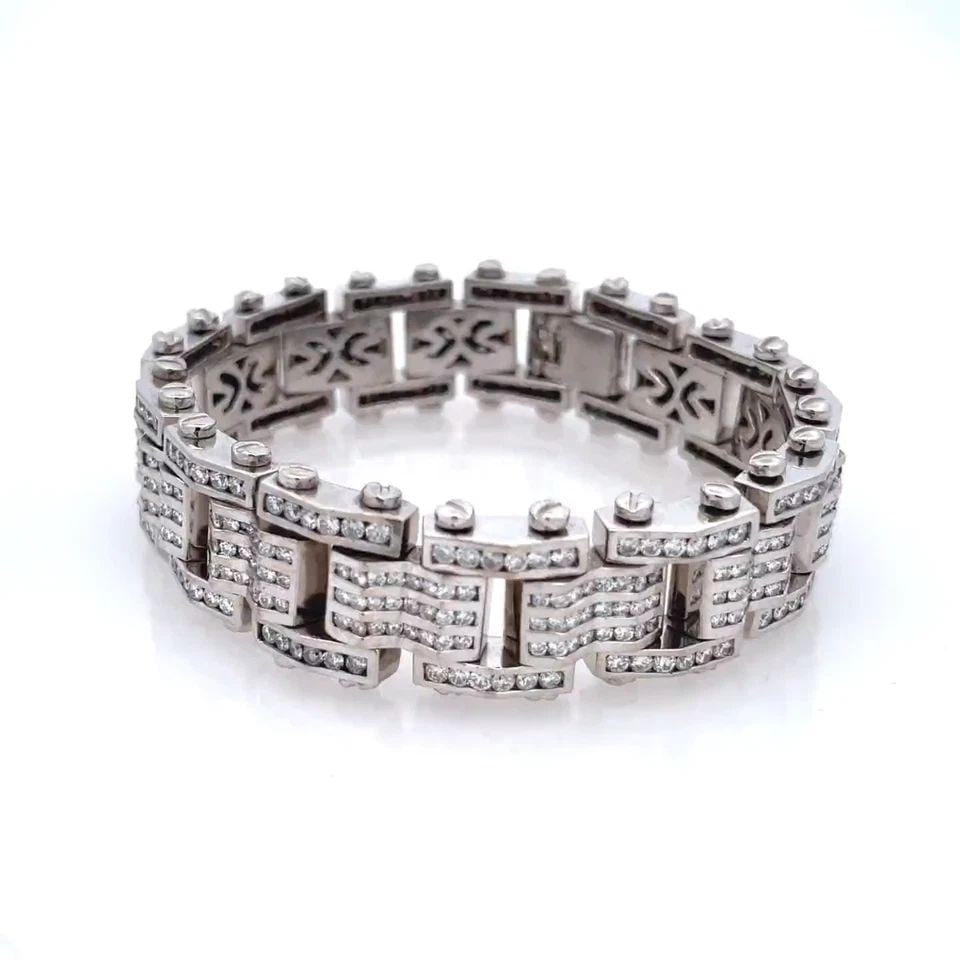 DIAMOND MEN'S BRACELET 14KT WHITE GOLD BAR LINK: DIAMOND MEN'S BRACELET 14KT WHITE GOLD BAR LINK DIAMOND MEN'S BRACELET 14KT WHITE GOLD BAR LINK This Diamond Men's Bracelet features a sleek design with 14kt white gold bar links that showcase channel