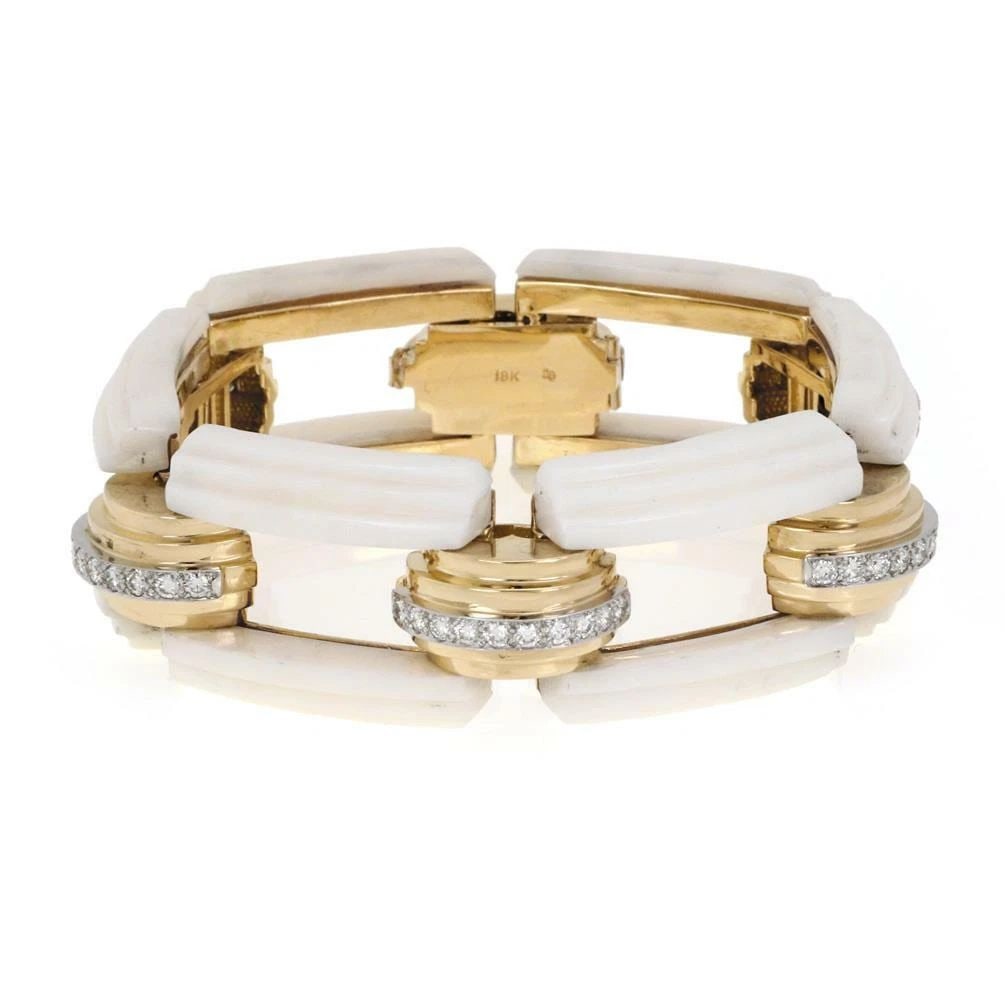 DIAMOND WHITE STONE BRACELET 18K GOLD 23.5MM FANCY LINK: DIAMOND WHITE STONE BRACELET 18K GOLD 23.5MM FANCY LINK DIAMOND WHITE STONE BRACELET 18K GOLD 23.5MM FANCY LINK The Diamond White Stone Bracelet in 18k Gold with a 23.5mm fancy link is a luxurious and