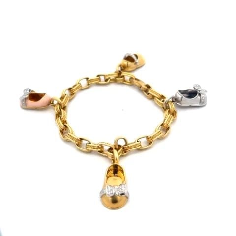 AARON BASHA 4 SHOE CHARM BRACELET 18K GOLD ENAMEL OVAL LINK: AARON BASHA 4 SHOE CHARM BRACELET 18K GOLD ENAMEL OVAL LINK AARON BASHA 4 SHOE CHARM BRACELET 18K GOLD ENAMEL OVAL LINK This is a charming 18k yellow gold chain bracelet features chasing oval links wi